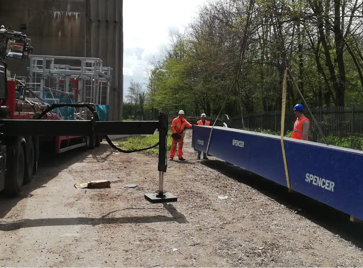 Spencer Bridge Engineers guiding a Spencer branded box