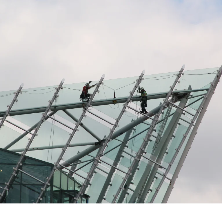 Spencer Engineers working in the glass point on the Deep building