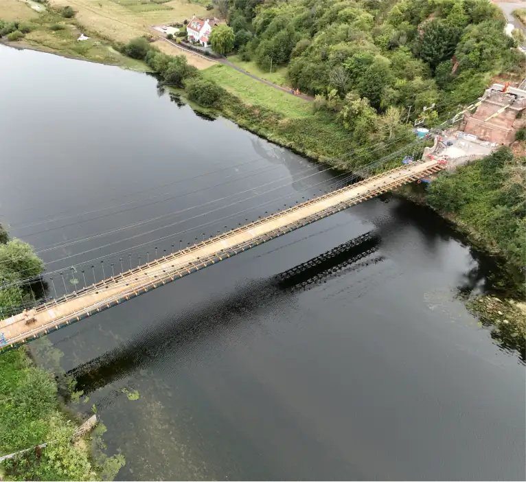 Drone shot of the Union Chain bridge with the wooden foundations