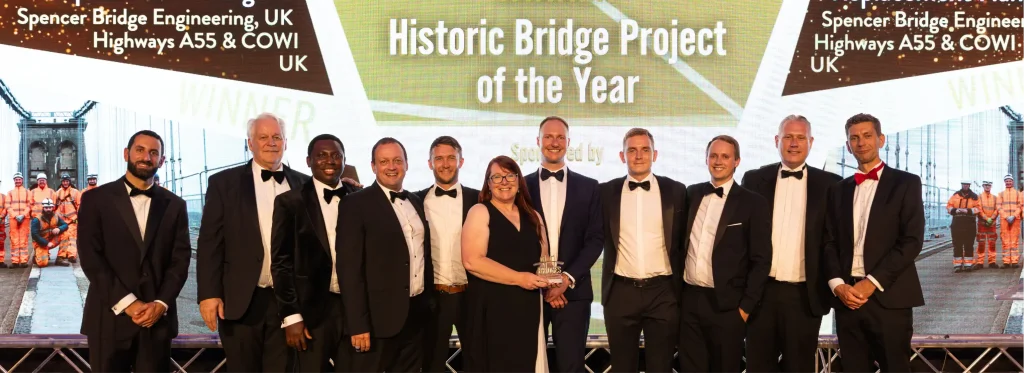 Spencer Bridge Engineering team stood on stage at NCE Bridges awards 2025 receiving their award