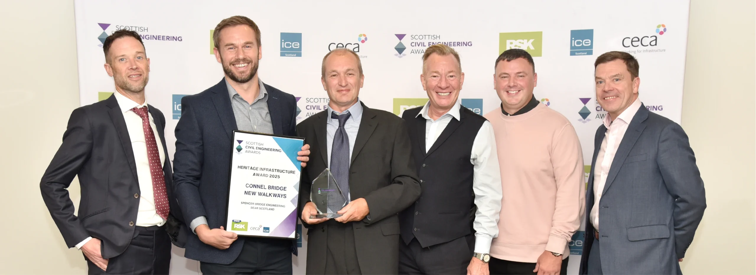 Spencer Bridge Team holding Heritage Infrastructure Award